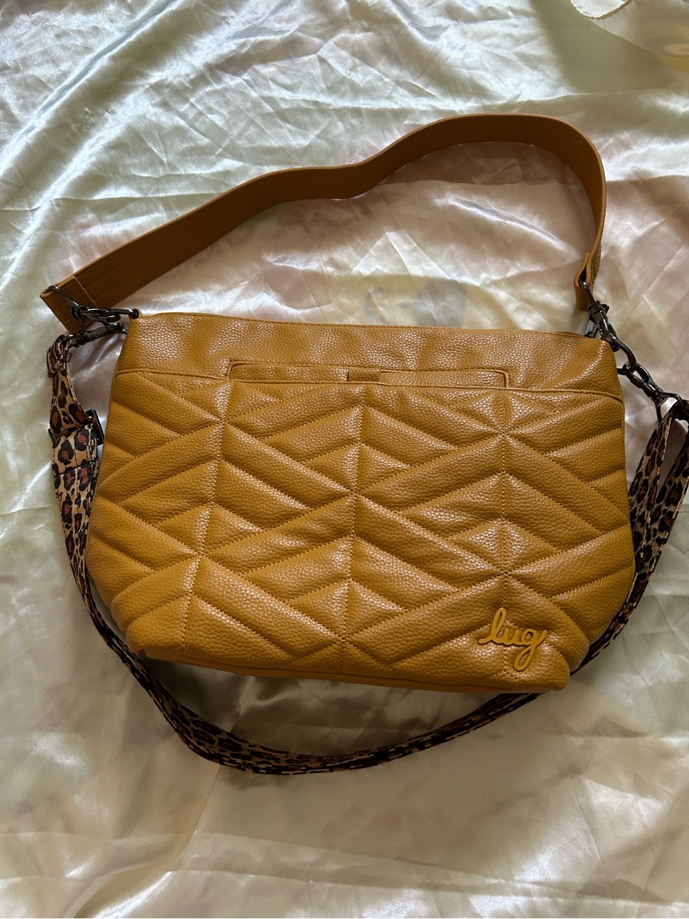 lug Quilted Crossbody Bag in Mustard with cheetah print shoulder strap